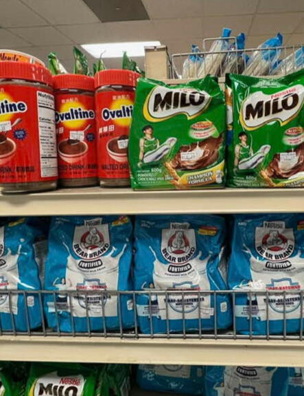 Different types of asian brand powdered milk such as milo, ovaltine, and bear brand, available in an Asian grocery store in Raleigh, North Carolina