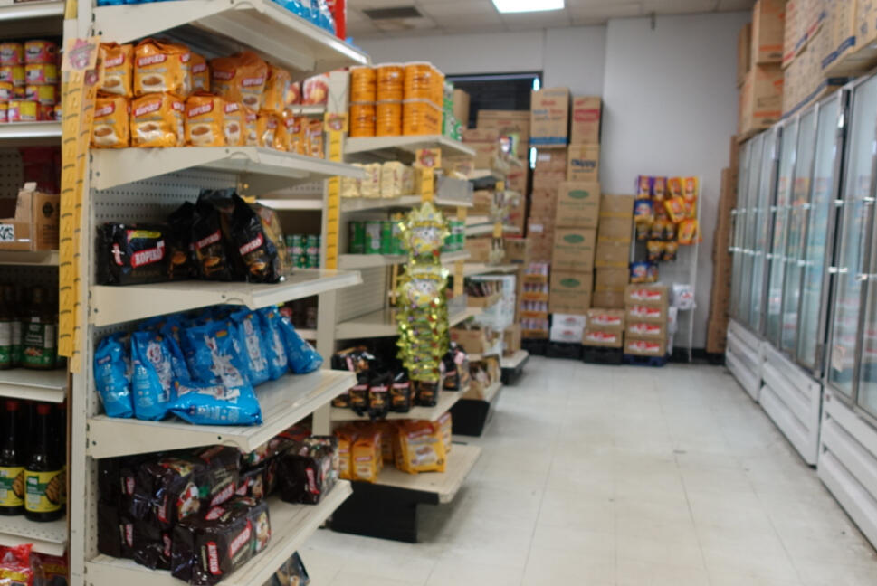 Asian store aisles with variety of snacks, ingredients, and novelty items.